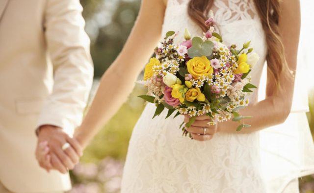 Шлюбний літній бум: у липні в Міському палаці одружили майже 80 пар